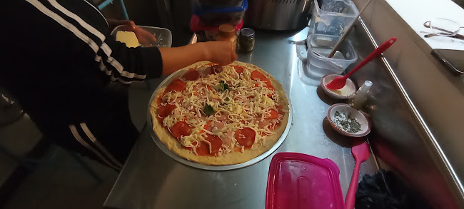 Rapitz. Restaurant. Desayunos. Almuerzos. Meriendas. Pizza. Crepes. Granizados