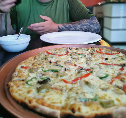 Opinii despre Pomodoro Pizzeria în Nueva Loja - Gastronomía y hostelería