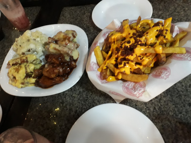 a media cuadra de Tia, Av Isidro Ayora, Guayaquil 090507