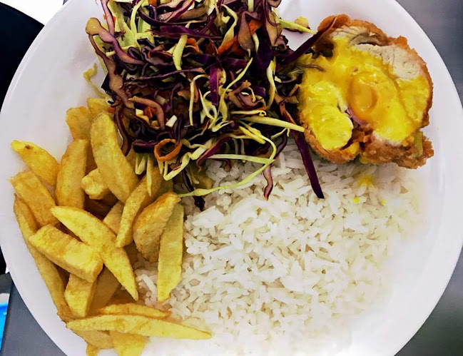 Rolli's Restaurante-Pollos y Carnes - Loja