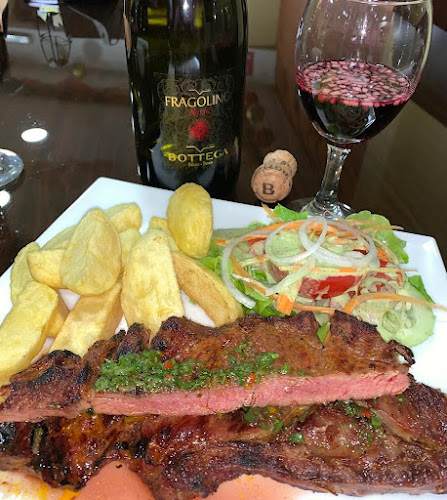 Mikey's Grill Carnes y Pizza - Latacunga